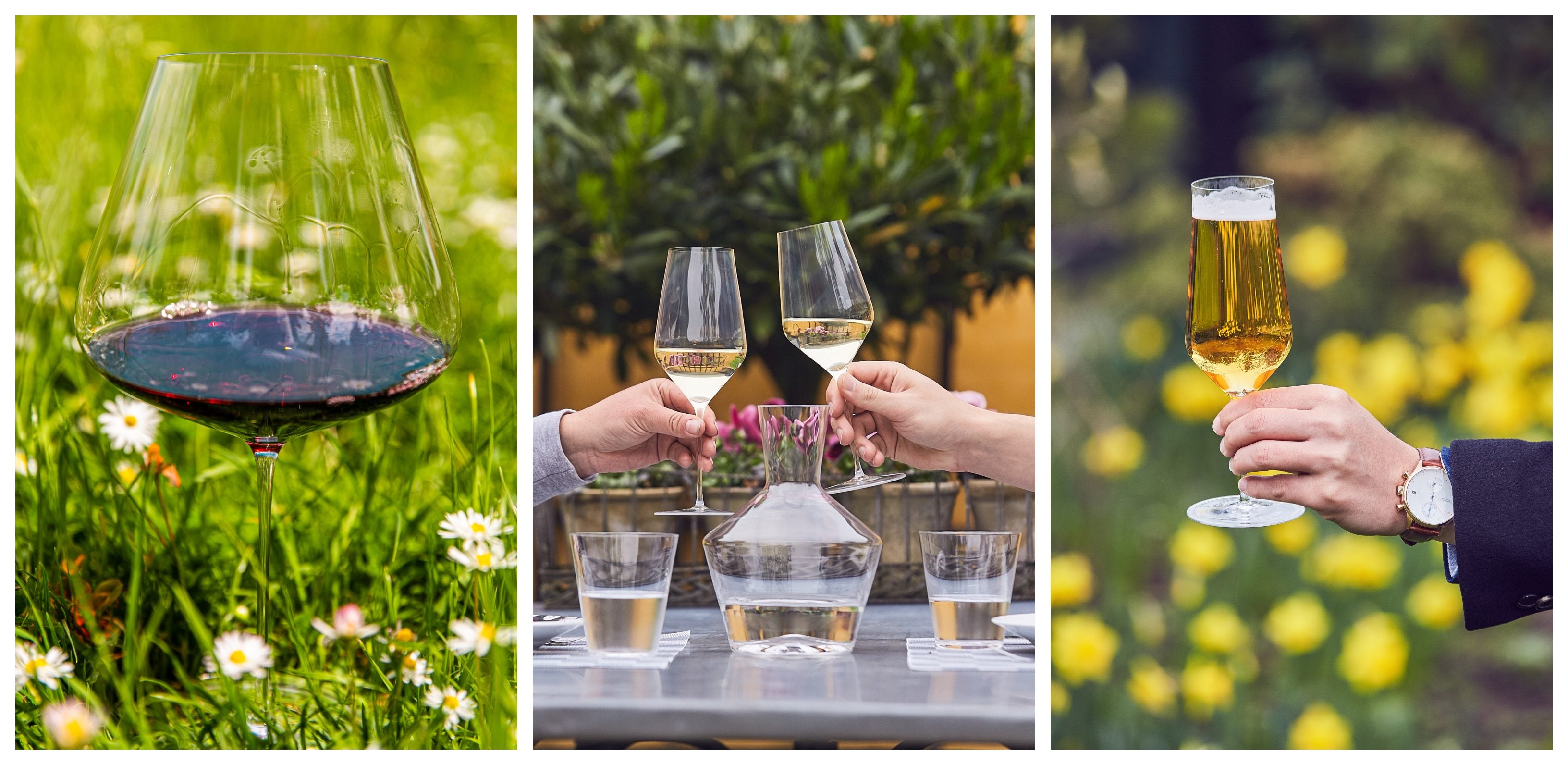 Zalto white wine glasses raised in a toast outdoors